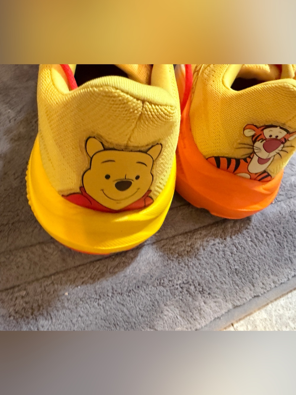 Brooks run Disney Pooh shoes.
